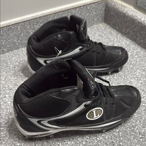 Black and White Athletic Shoes with Cleated Soles